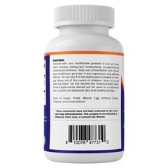 Vitamatic cápsula junto a moneda para escala, apreciable tamaño de la cápsula