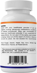 Vitamatic producto en escritorio junto a laptop, sugiere uso para concentración laboral