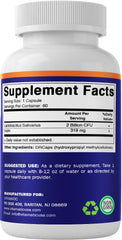Vitamatic suplemento en uso diario junto a vaso de agua