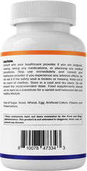 Vitamatic tableta junto a moneda para comparar tamaño y dosificación