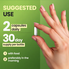 Vitamax cápsula en mano ilustrando dosis diaria y uso conveniente