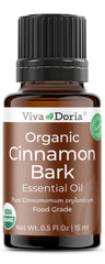 Viva Doria frasco delantero 15 mL mostrando envase de vidrio y cierre seguro, beneficios: conservación del aroma
