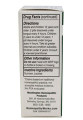 Washington Homeopathic frasco junto a una regla para comparar tamaño y cantidad