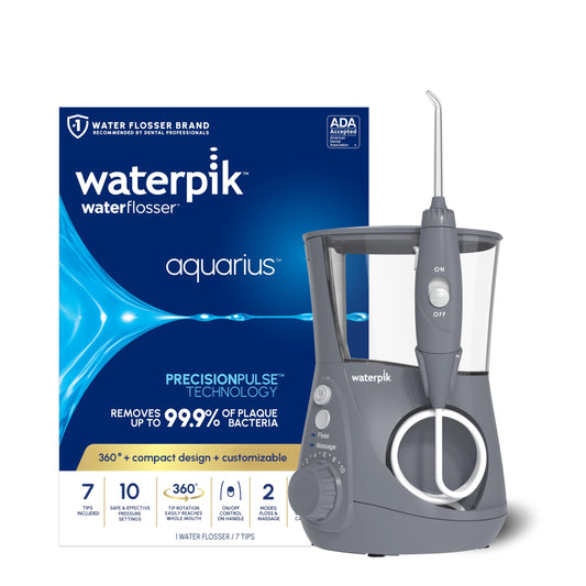Waterpik Aquarius frontal gris mostrando base y depósito, limpieza eficiente