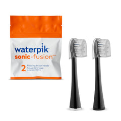 Waterpik vista frontal del embalaje con dos cabezales, garantiza recambio original