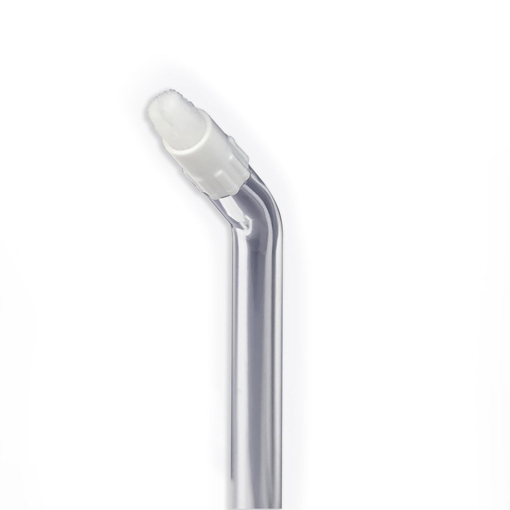 Waterpik punta en uso limpiando brackets, mayor remoción de residuos