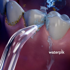Waterpik puntas Precision junto a objeto de escala muestra tamaño y fácil manejo
