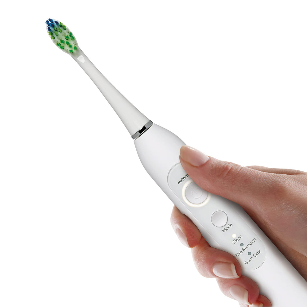 Waterpik cabezal instalado en cepillo Sensonic demostrando compatibilidad