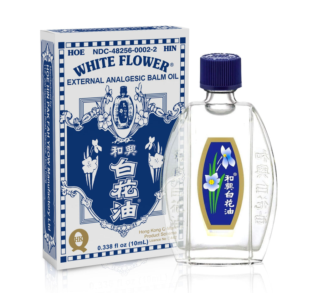 White Flower frasco frontal 10 ml mostrando diseño y tamaño portátil para alivio tópico