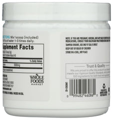 Detalle en primer plano del polvo de L-Glutamina de Whole Foods Market, fácil disolución