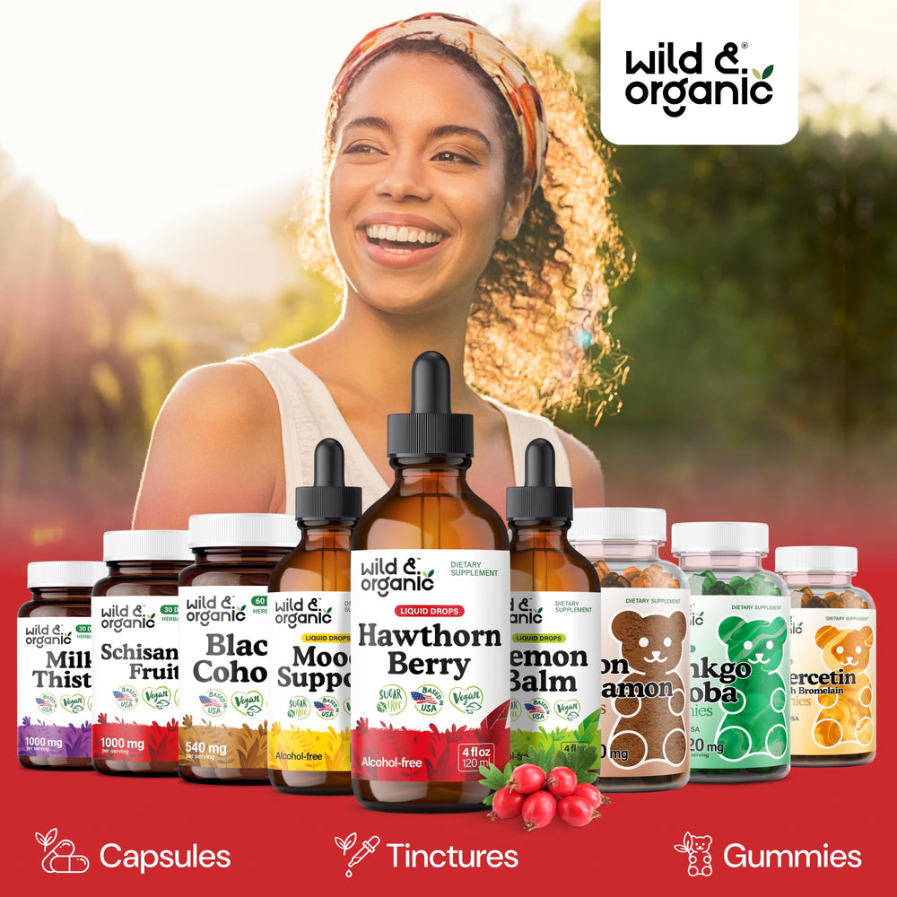 Wild & Organic botella en mano demostrando tamaño portátil y práctico