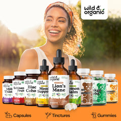 Wild & Organic frasco junto a regla para comparar tamaño y capacidad 4 fl oz