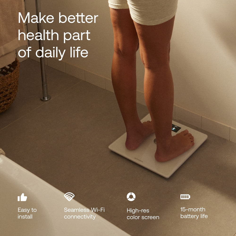Withings Body Smart en uso pesando a un bebé para medición segura y cómoda