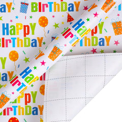 woric rollo desplegado con velas, globos, lunares y rayas coloridas