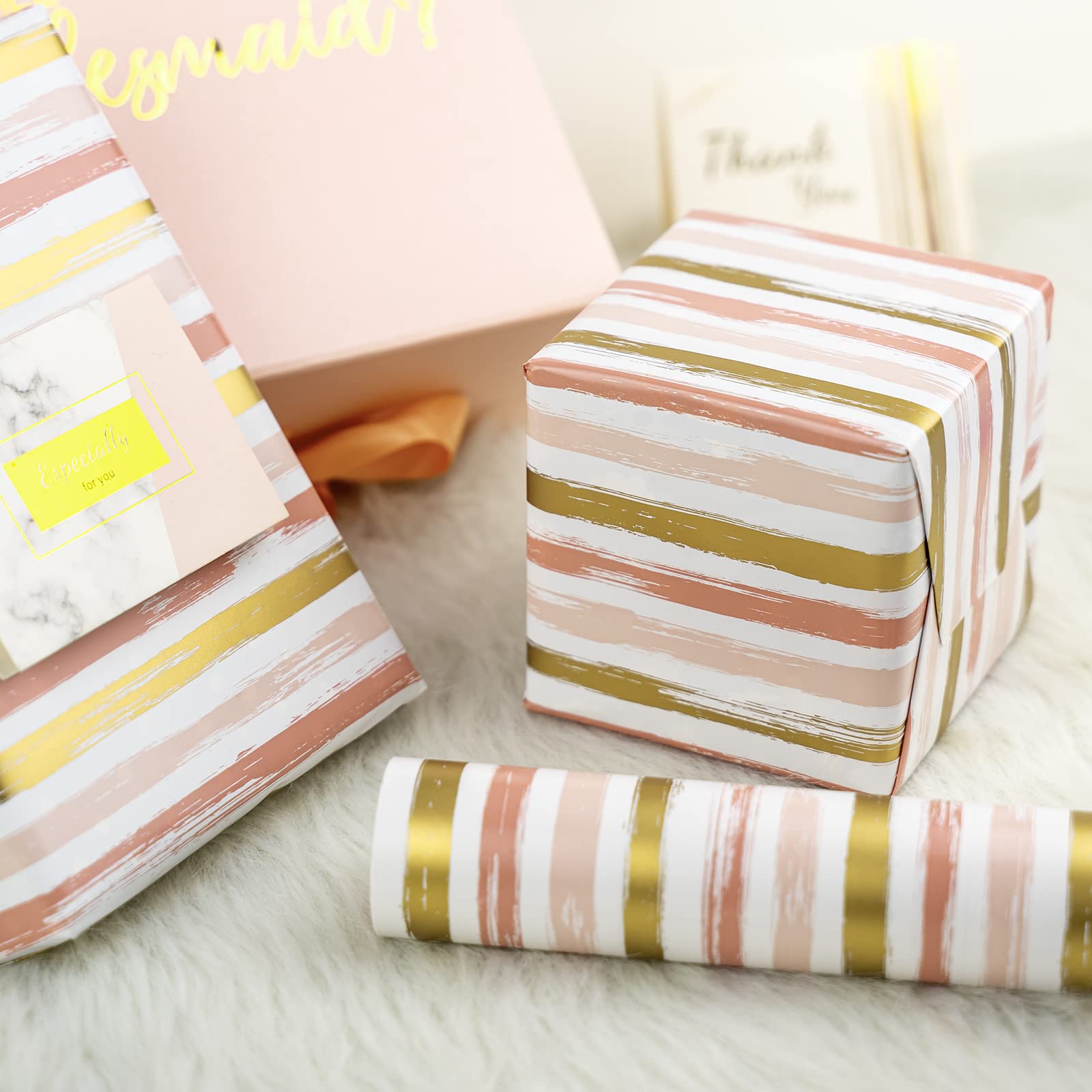 WRAPAHOLIC comparación de tamaño en manos para escala clara