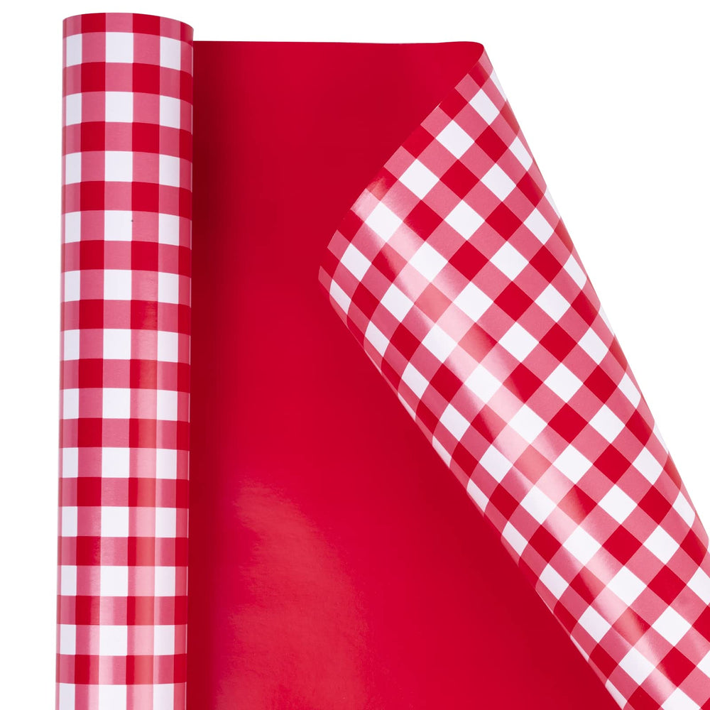 WRAPAHOLIC en uso envolviendo caja de regalo, ofrece acabados limpios y apariencia festiva