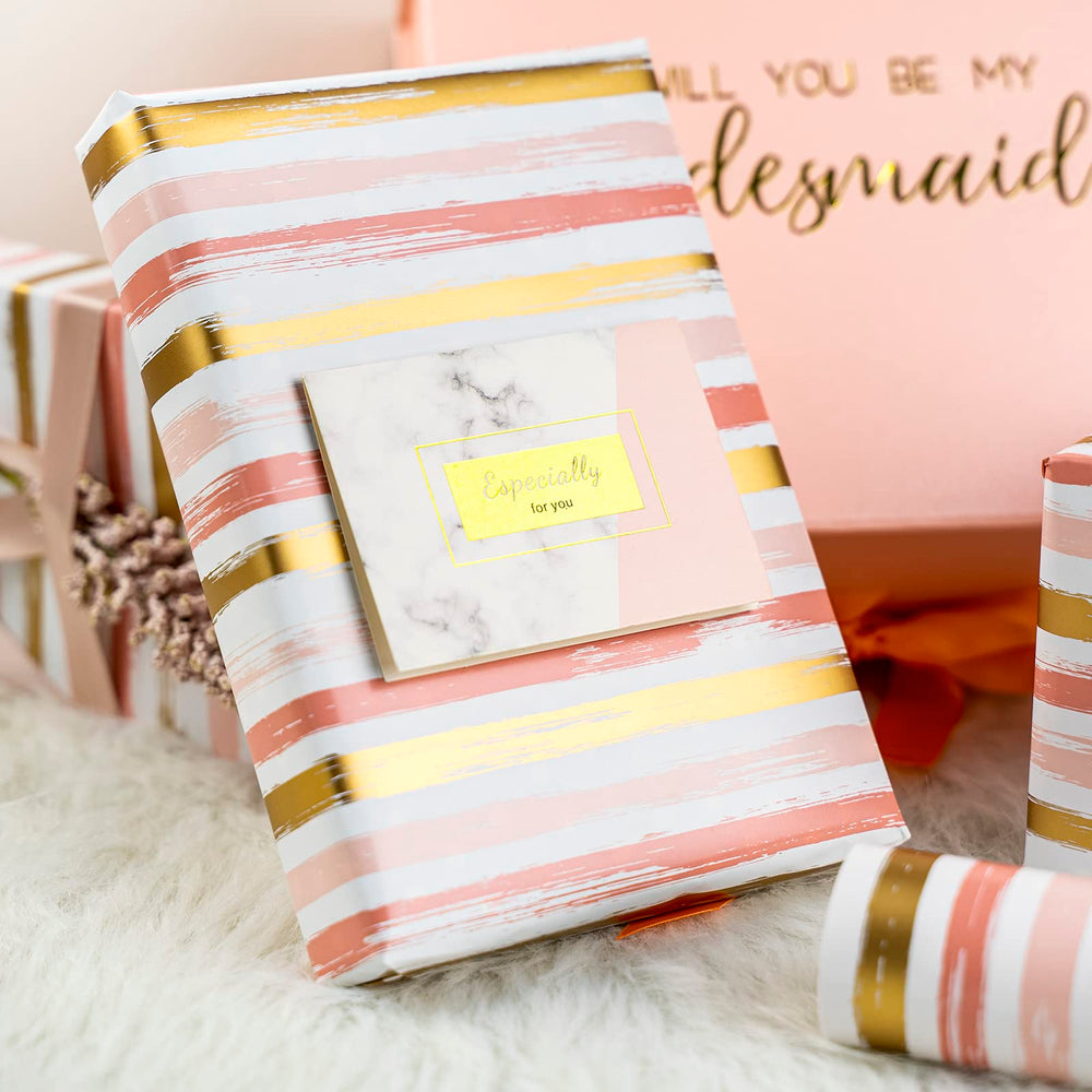WRAPAHOLIC detalle de líneas doradas realzando el acabado