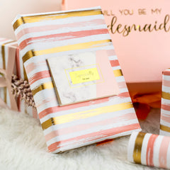 WRAPAHOLIC detalle de líneas doradas realzando el acabado