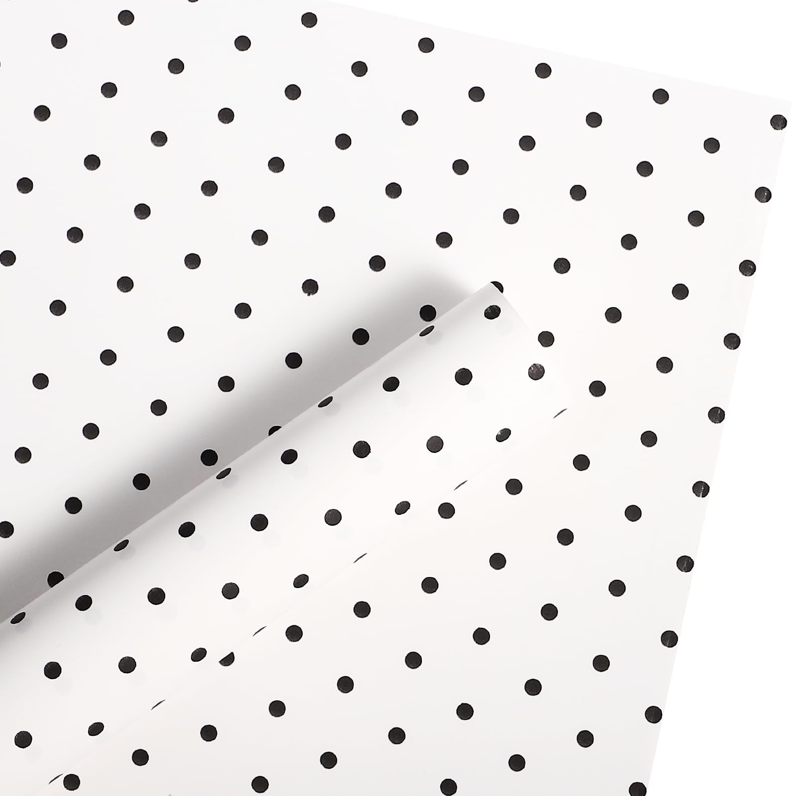 WRAPAHOLIC ramo envuelto con papel lunares mostrando acabado profesional