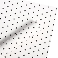 WRAPAHOLIC ramo envuelto con papel lunares mostrando acabado profesional