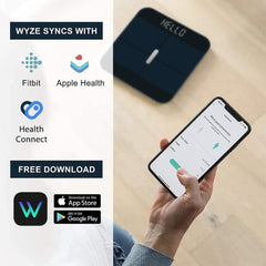WYZE báscula en uso con pies descalzos para mediciones consistentes