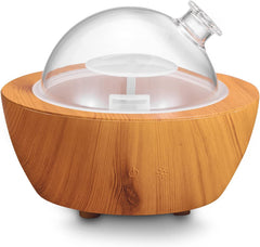 XANAPHIA difusor frontal de cristal y base madera mostrando diseño elegante y funcionalidad