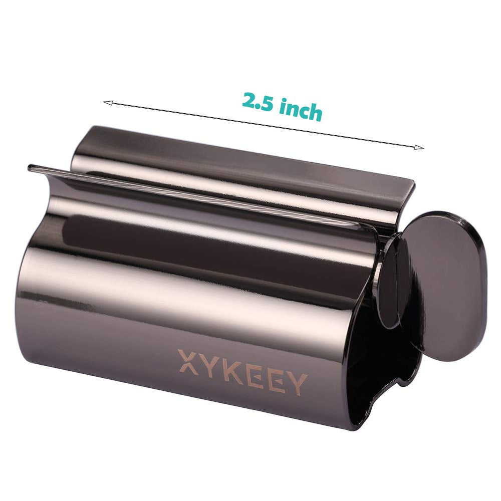XYKEEY aplicador en uso exprimiendo pasta dental eficientemente