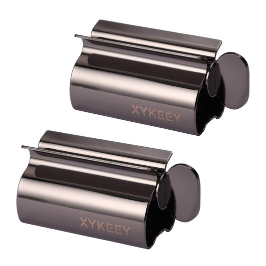 XYKEEY exprimidor frontal mostrando rodillos y base, ahorra pasta dental