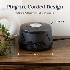 Yogasleep Dohm Classic cable enchufado demostrando conexión simple y uso inmediato