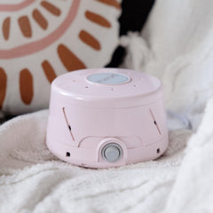 Empaque y etiqueta YOGASLEEP Dohm Classic rosa que muestran marca y modelo
