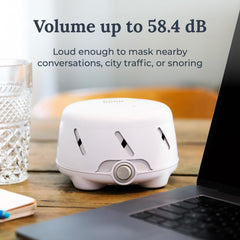 YOGASLEEP Dohm Uno junto a cuna calmando y protegiendo sueño del bebé