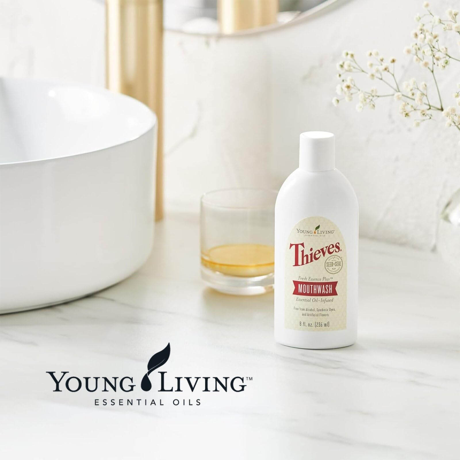 Young Living aceites esenciales (menta y limón) mostrando origen botánico
